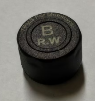 BPU100 BLE tyre-pressure sensor viewed from the front, showing the sensor housing face